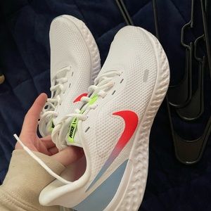 Nike revolution. Great condition. Worn once. Size 8.5 womens